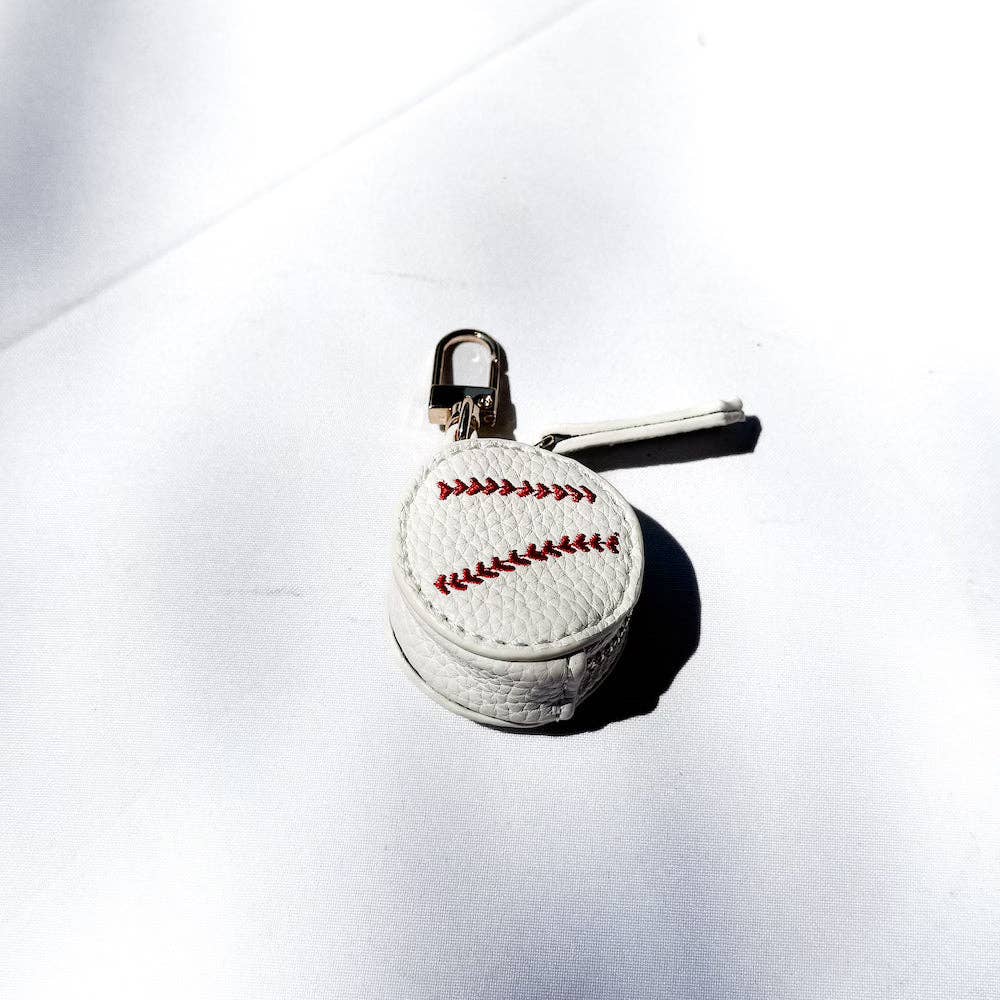 Baseball-shaped keychain on a white background