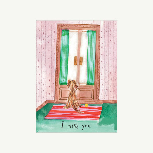 Illustration of a person sitting on a rug in front of a door with 'I miss you' text.