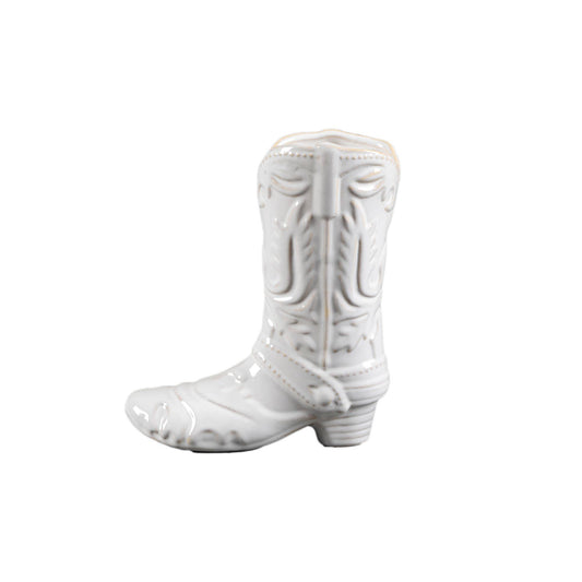 White ceramic cowboy boot shaped vase on a white background