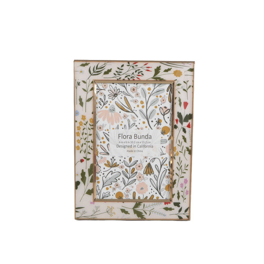 Decorative photo frame with floral design on a white background