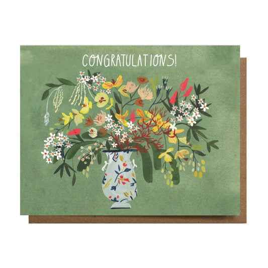 Greeting card with floral design and 'Congratulations!' text on a green background