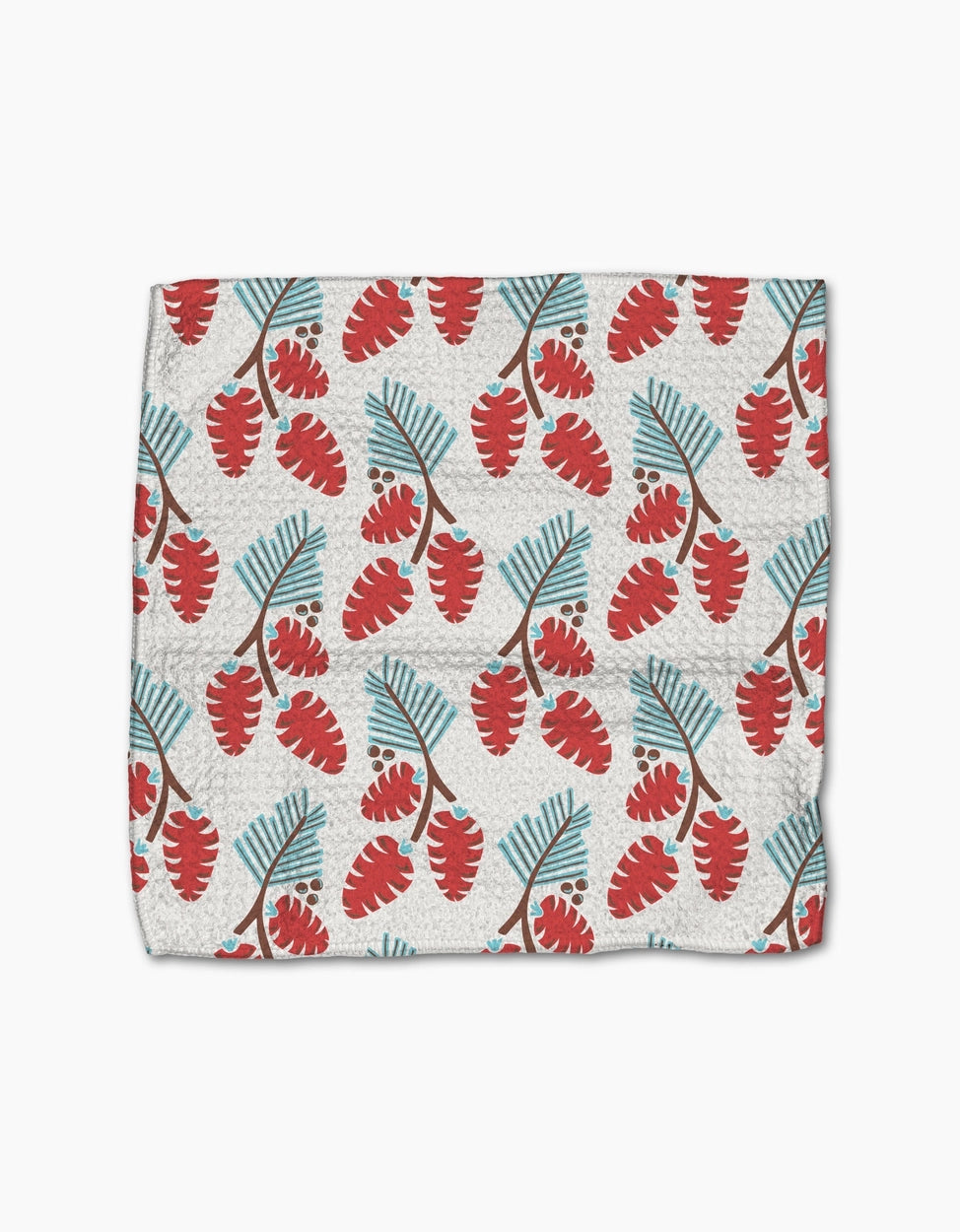 Fabric with red and green leaf pattern on a white background