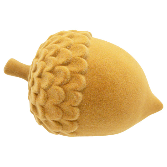 A plush acorn-shaped pillow in a warm mustard yellow color, featuring a textured, raised cap and a short stem, shown on a plain white background.