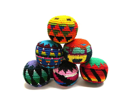 Colorful crocheted balls on a white background
