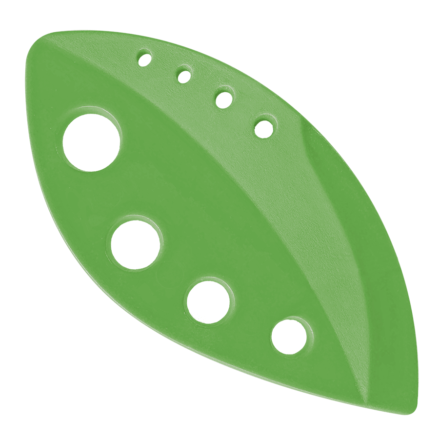Green sanding disc with multiple holes on a black background