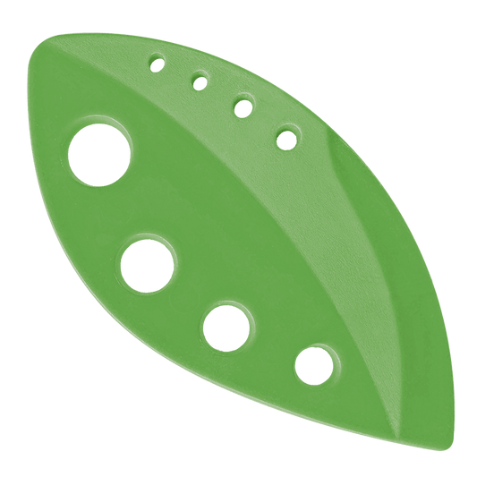 Green sanding disc with multiple holes on a black background