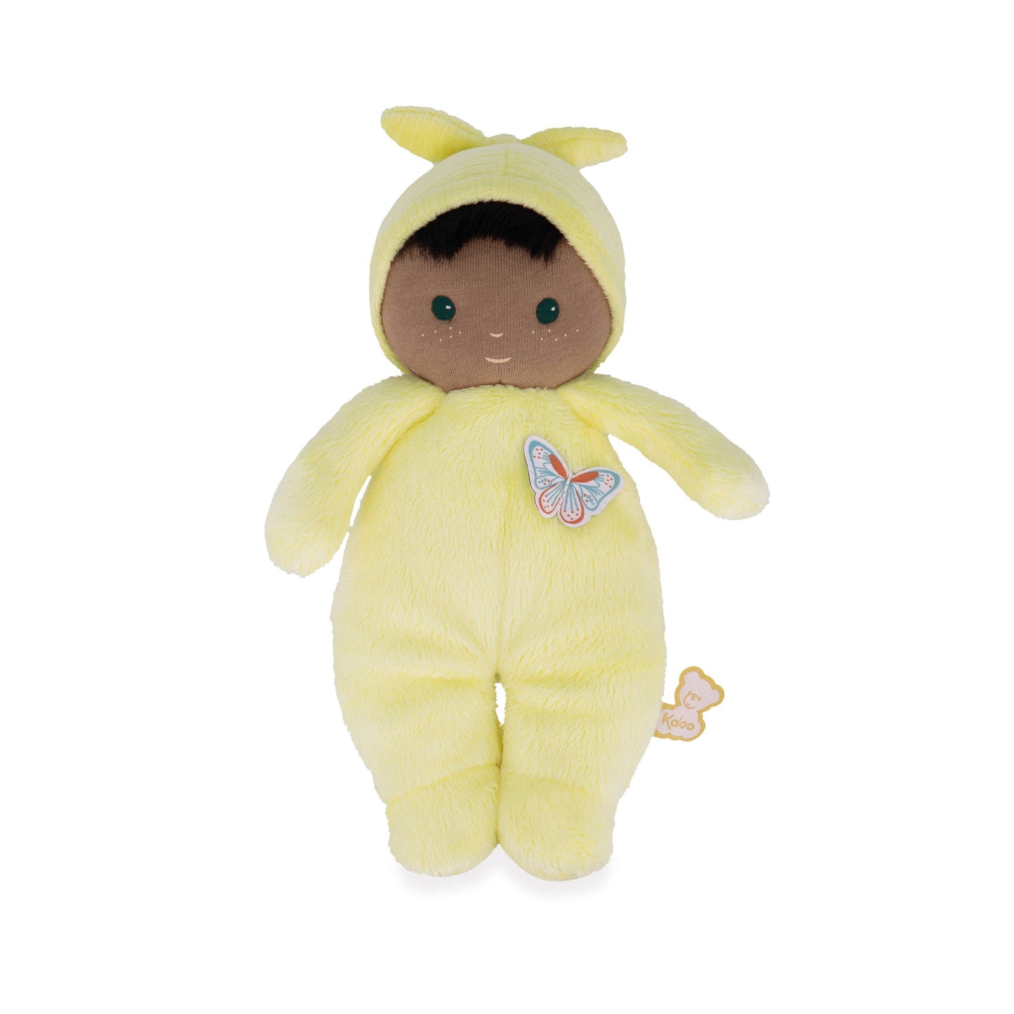 Plush toy baby doll in a yellow outfit with a butterfly patch on a white background
