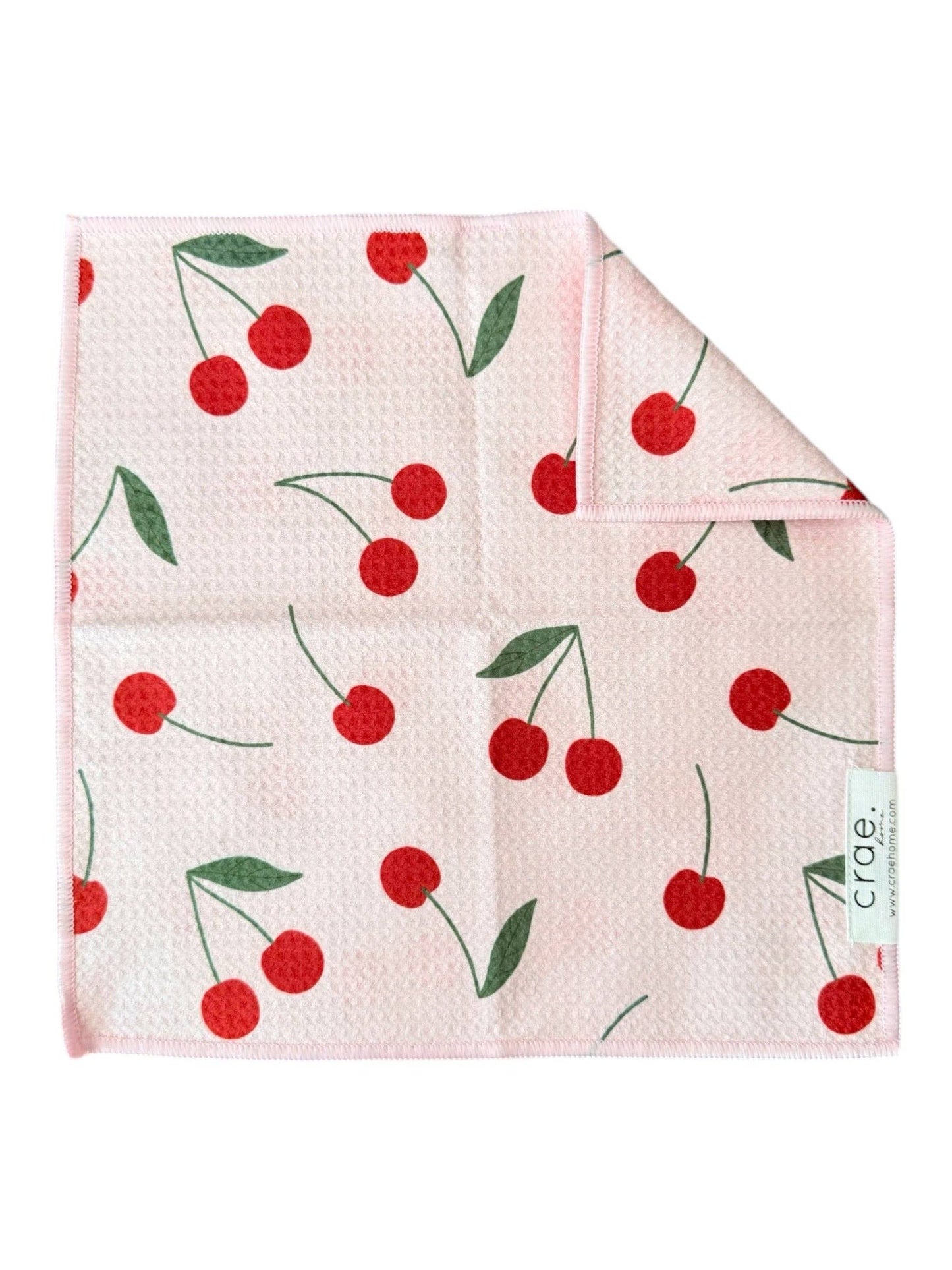Wipe with cherry pattern on a white background