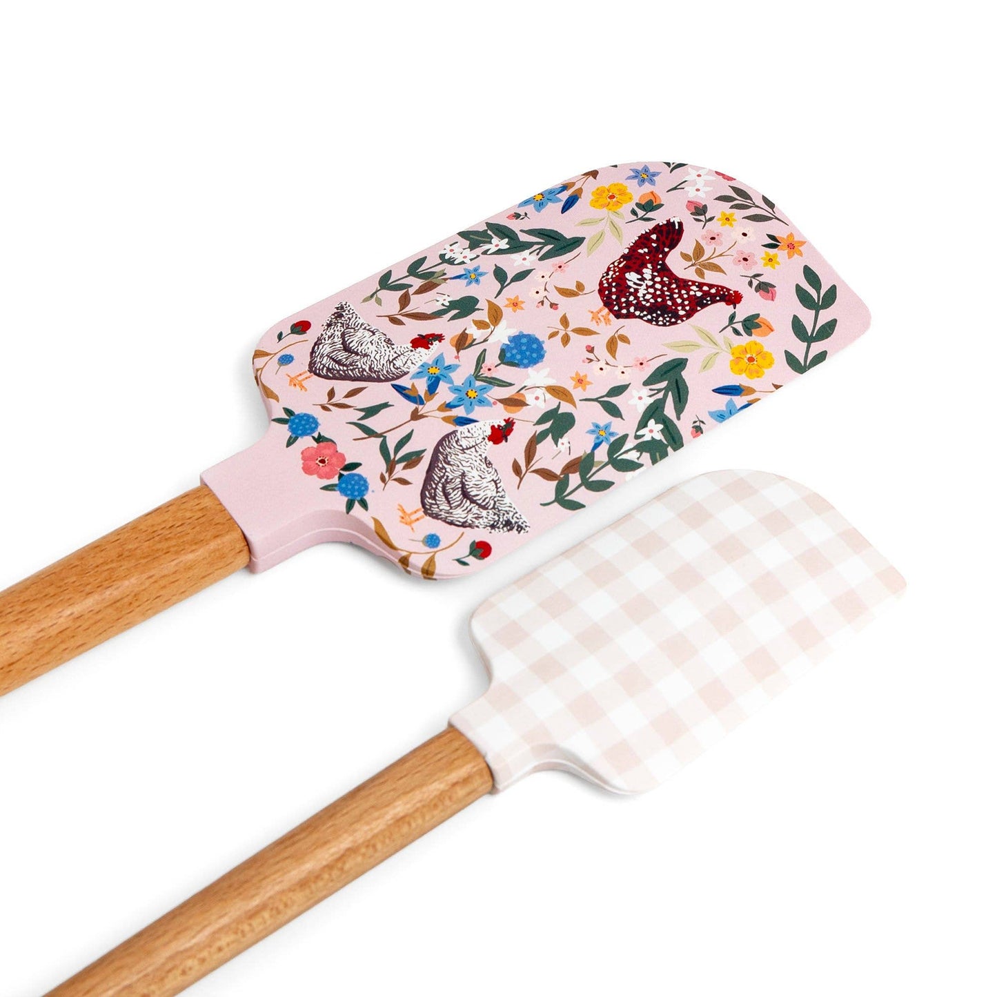 Floral-patterned spatula with wooden handle on a white background