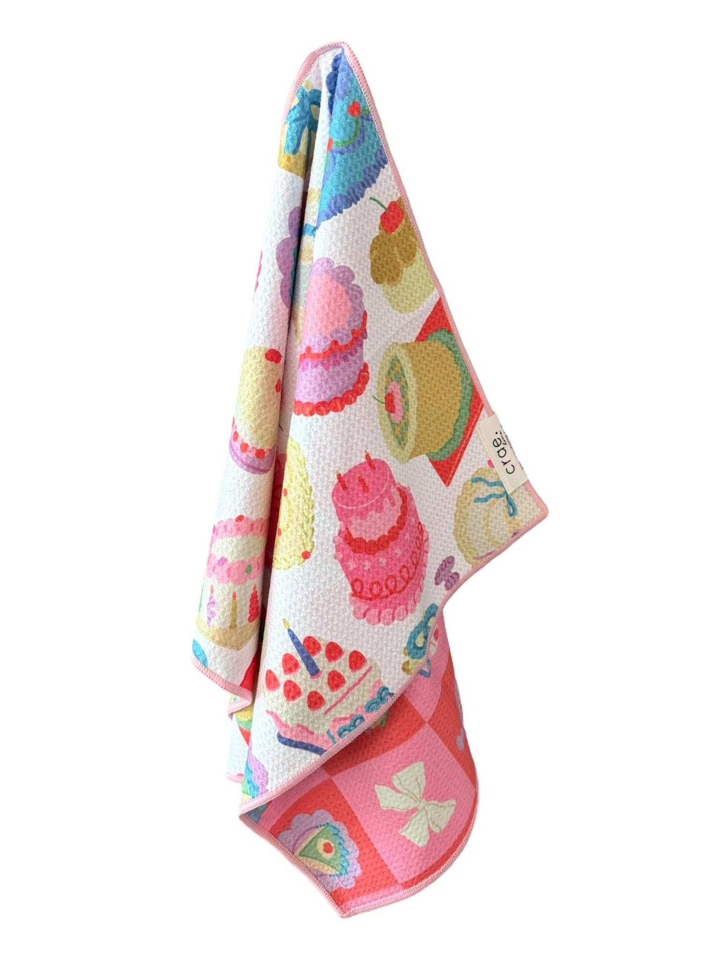 Colorful towel with cartoon designs on a white background