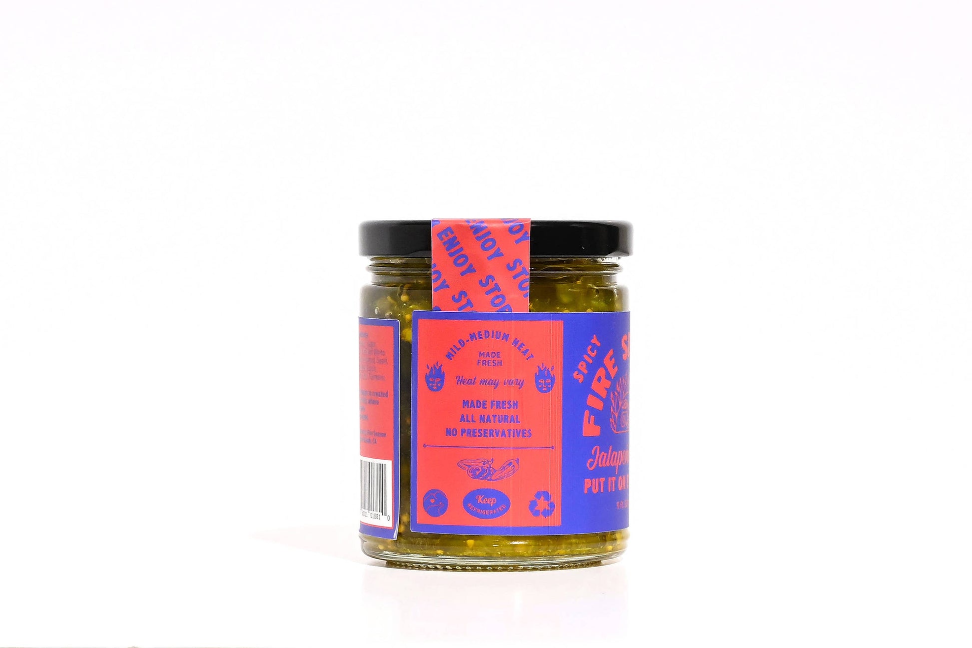 Jar of pickles with a colorful label on a white background