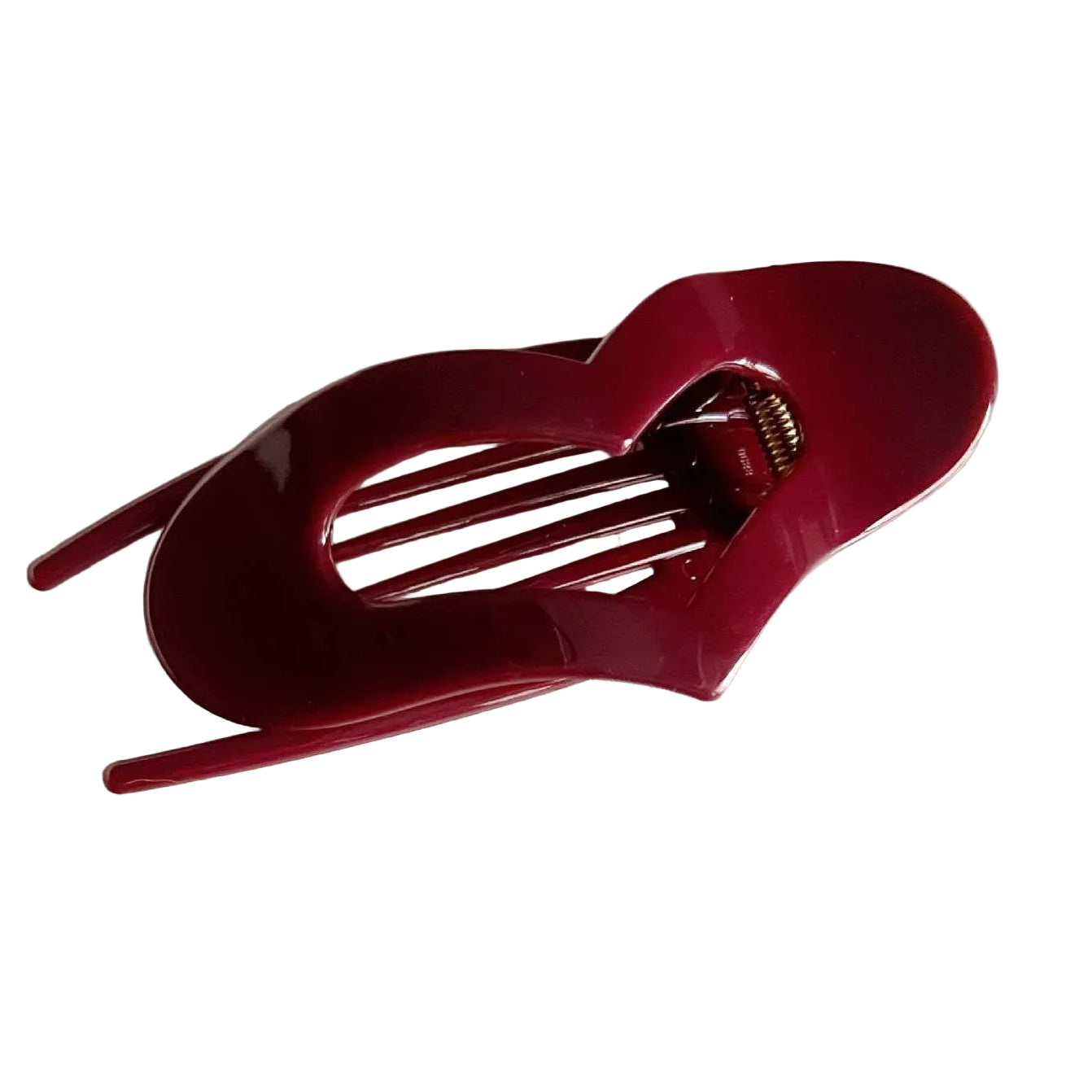 Dark red, heart shaped "lay-flat" claw clip on a white background