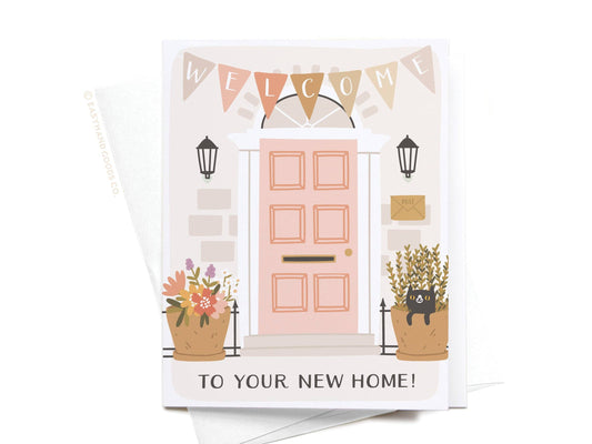 Greeting card with a pink door, plants, and 'Welcome to your new home!' text on a white background.
