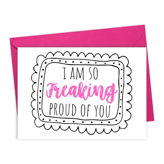 Card with 'I am so freaking proud of you' text on a white background with a pink envelope.