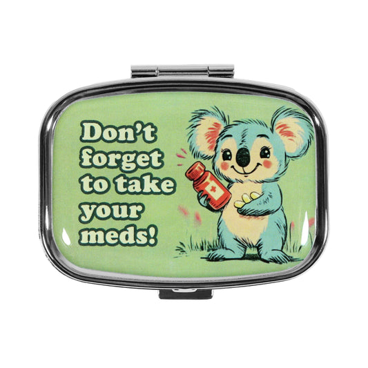 Pill box with a koala illustration and text 'Don't forget to take your meds!' on a green background