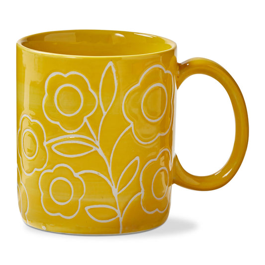 A bright and glossy yellow mug with white line drawn flowers and leaves. On a white background