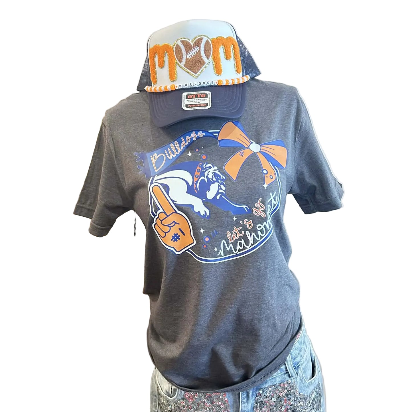 Gray t-shirt with sports team logo and matching cap on a mannequin with a white background