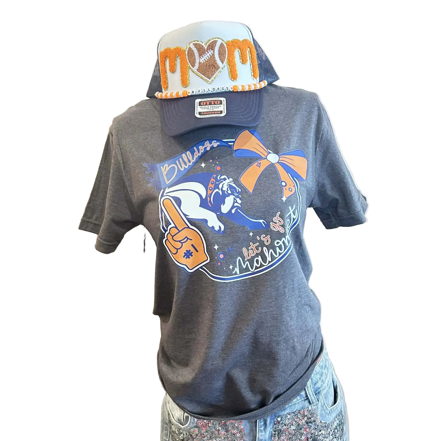 Gray t-shirt with sports team logo and matching cap on a mannequin with a white background