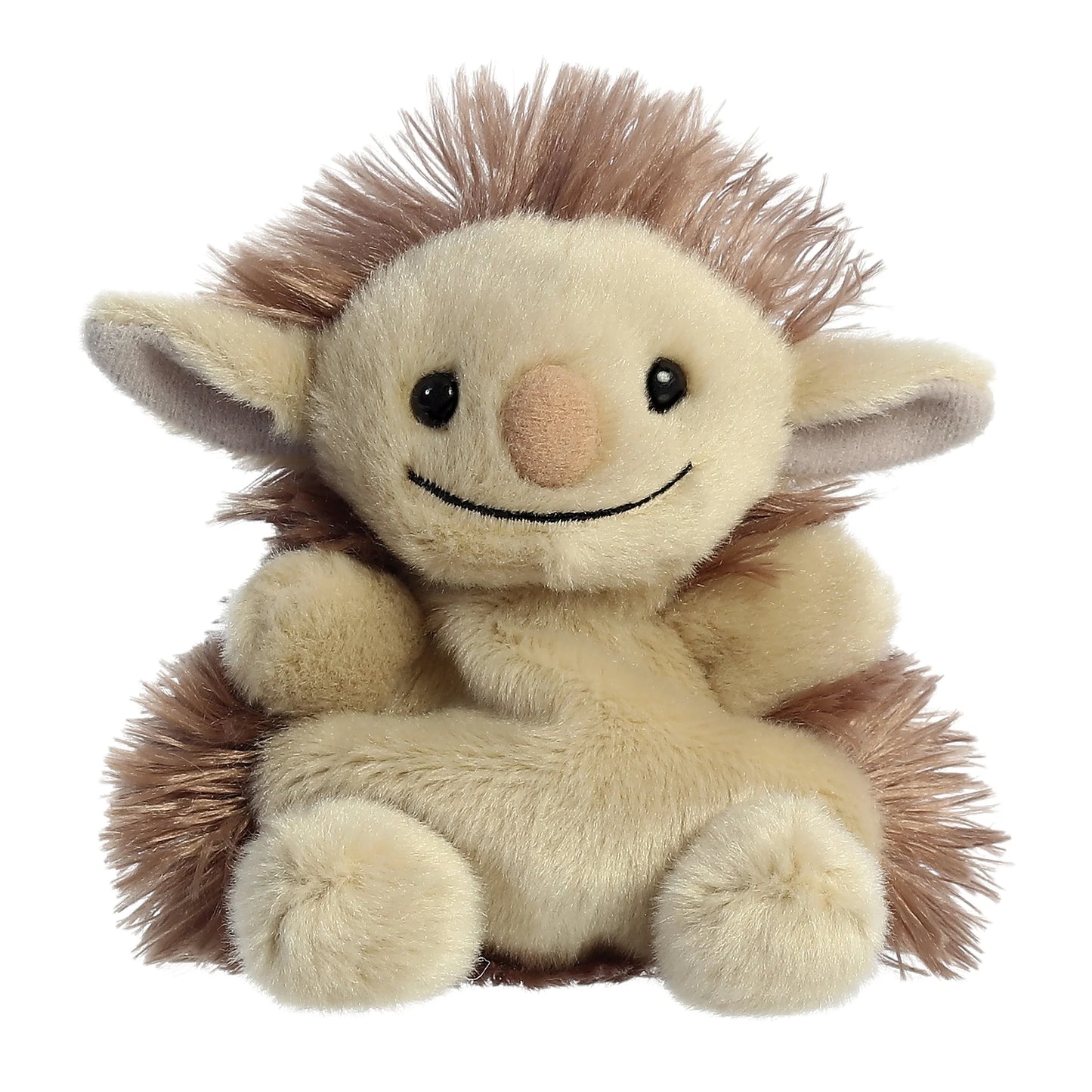 Plush toy resembling a creature with a smiling face on a white background
