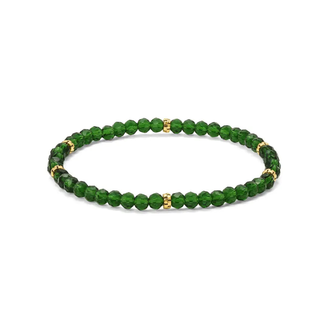 Forest green beaded bracelet with gold accents on a white background