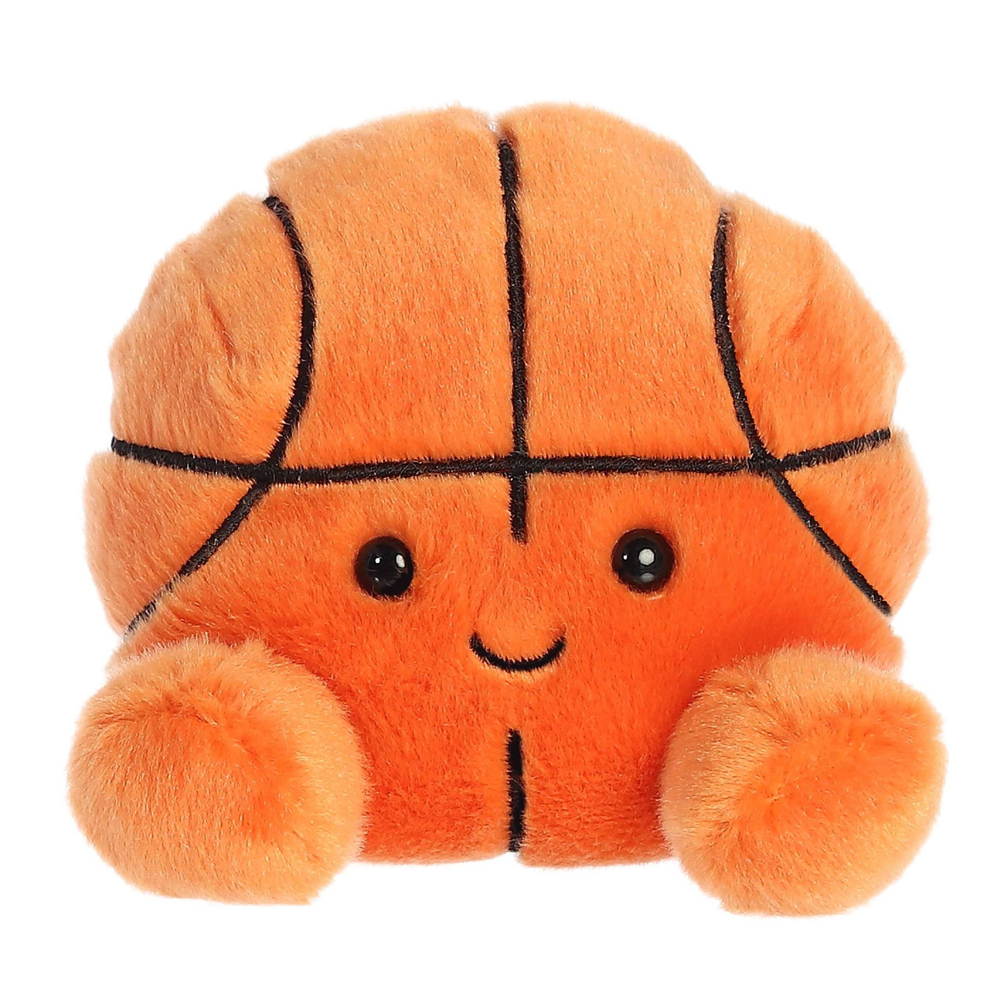 Plush toy shaped like a basketball with a face on a white background