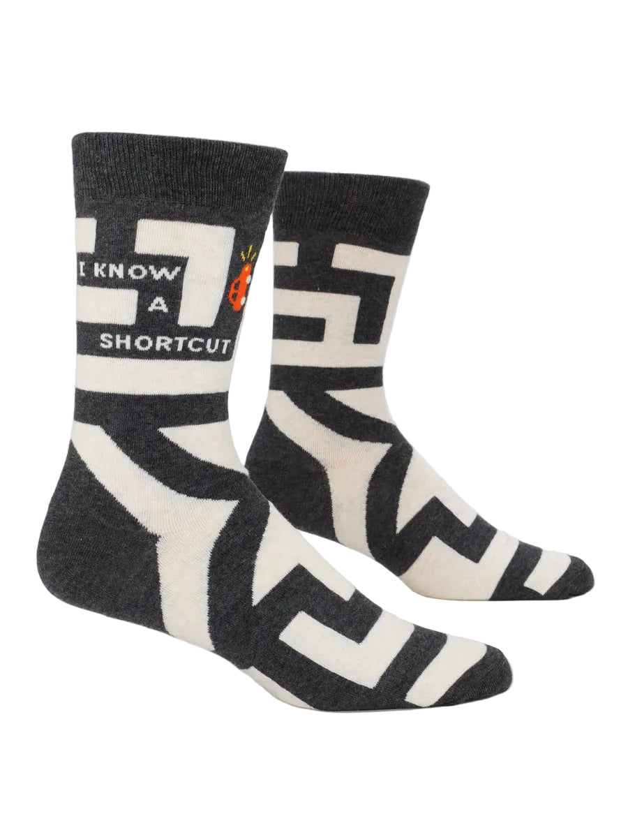 Black and white socks with geometric pattern on a white background