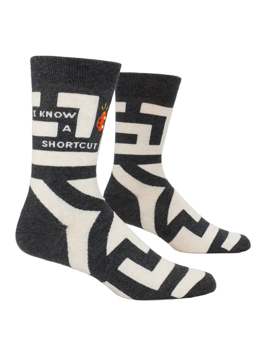 Black and white socks with geometric pattern on a white background