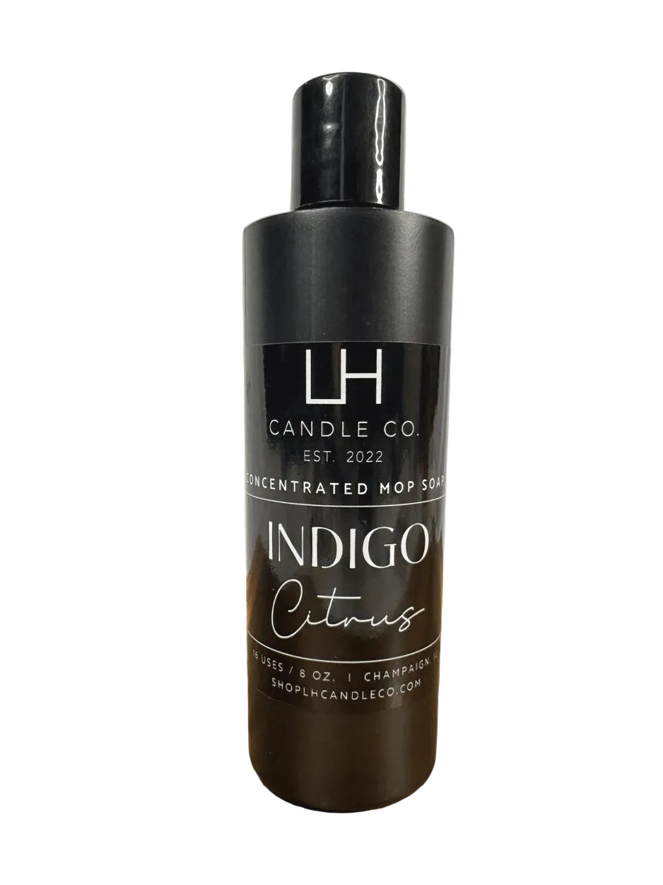 Black bottle of 'Indigo Citrus' soap from LH Candle Co on a white background