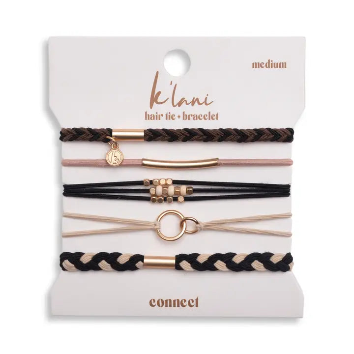 Set of hair ties and bracelets on a white card with 'klani' branding.