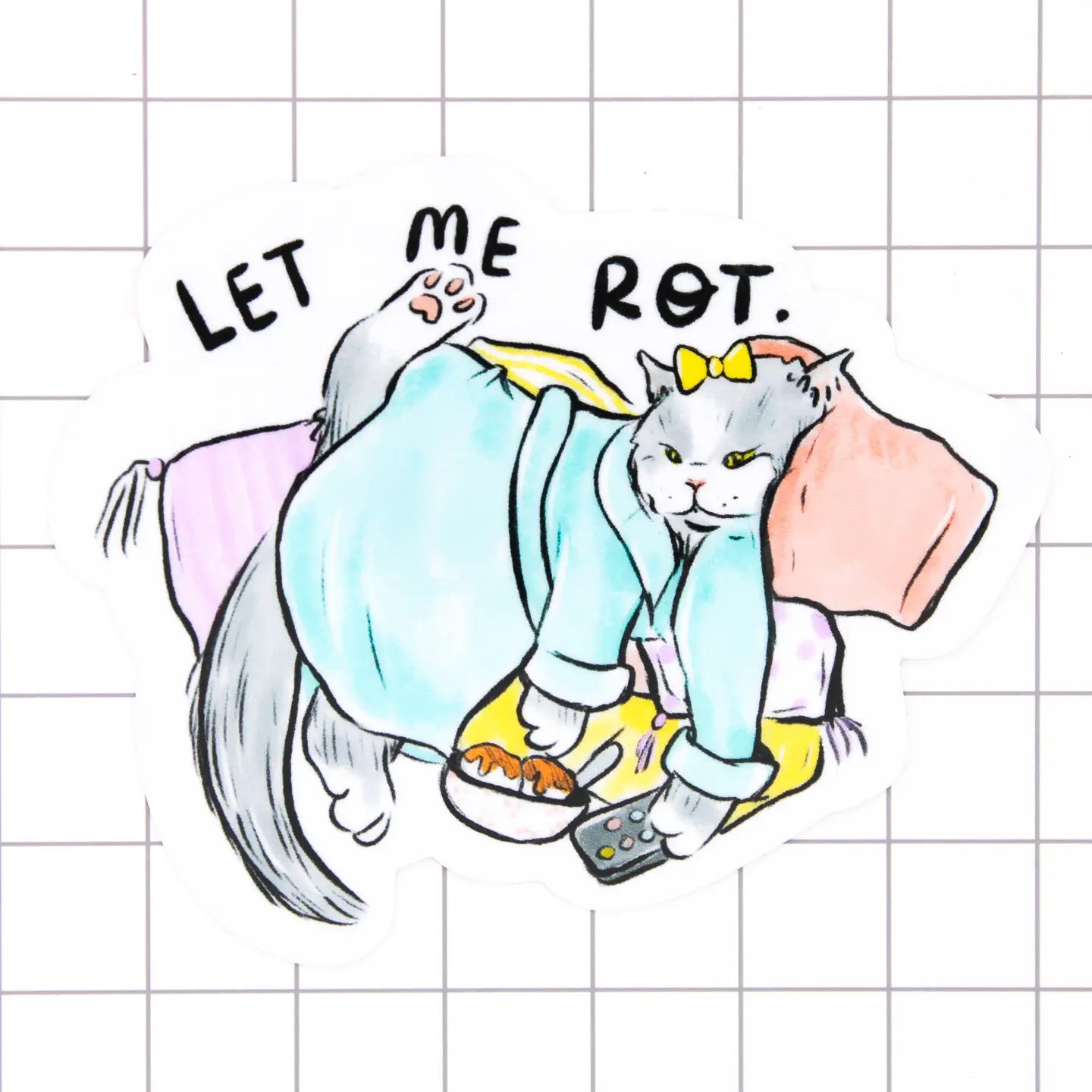Sticker of a cat in pajamas laying on pillows, remote and snack bowl in paws, with 'Let Me Rot' text, in front of a white gridded background