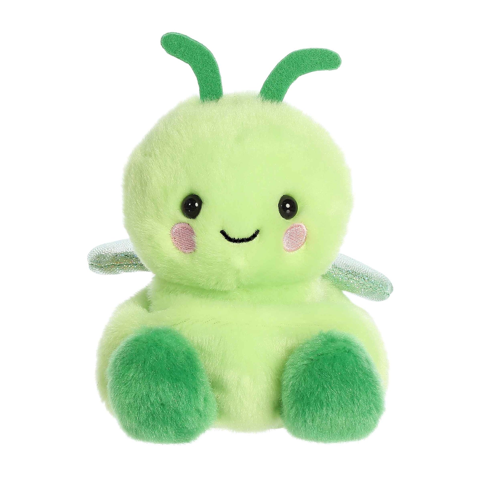 Green plush toy with a smiling face on a white background