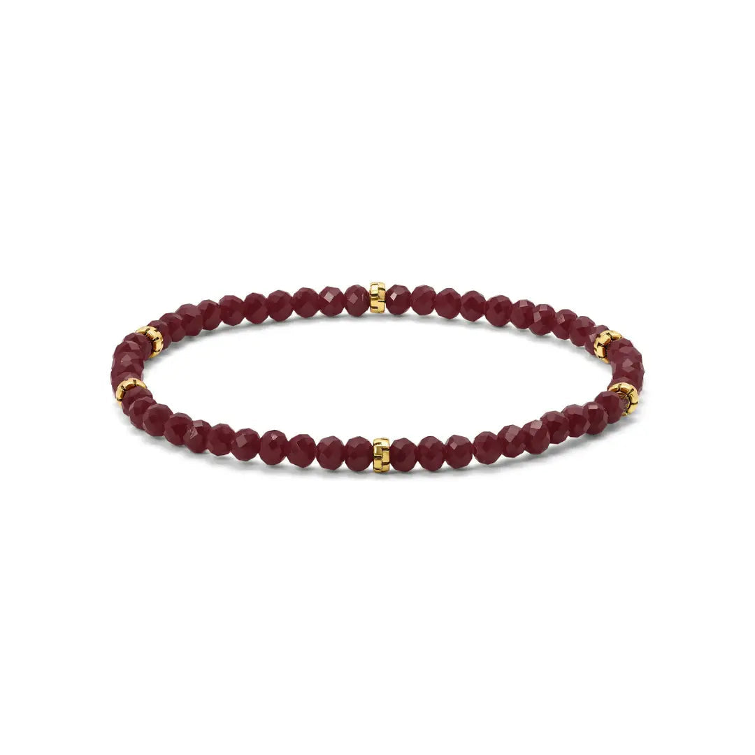 Maroon beaded bracelet with gold accents on a white background