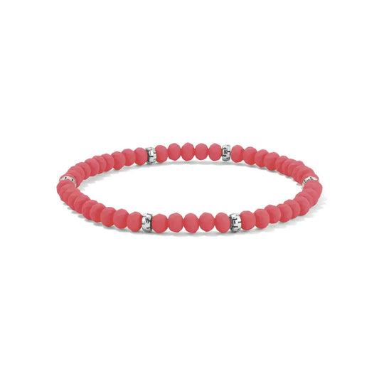 Neon flamingo pink beaded bracelet with silver accents on a white background