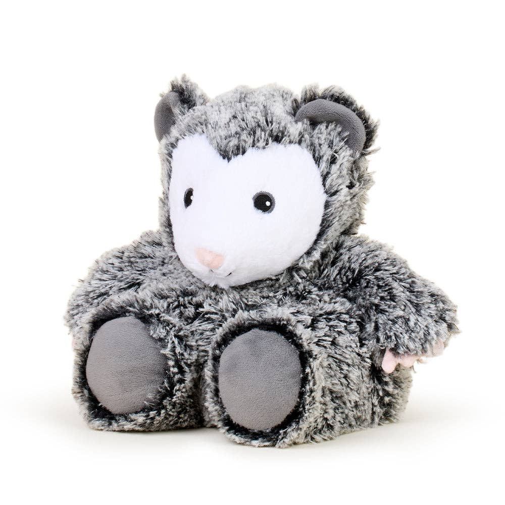 Plush toy shaped like a gray and white creature on a white background