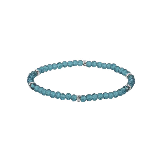 Peacock blue beaded bracelet with silver accent on a white background