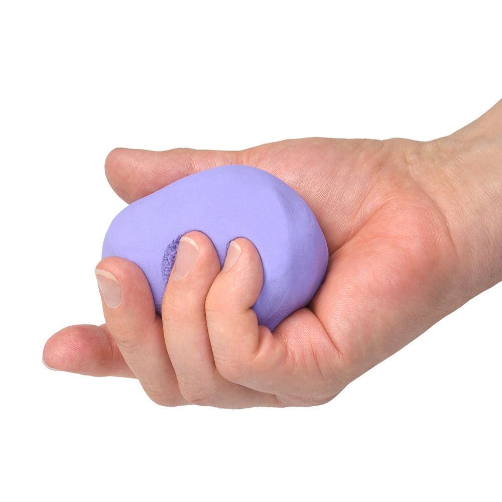 Hand holding a purple therapy dough against a white background