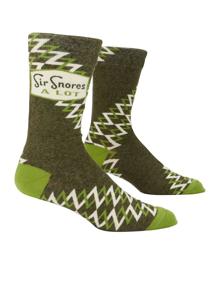 Green socks with white zigzag pattern and text on a white background