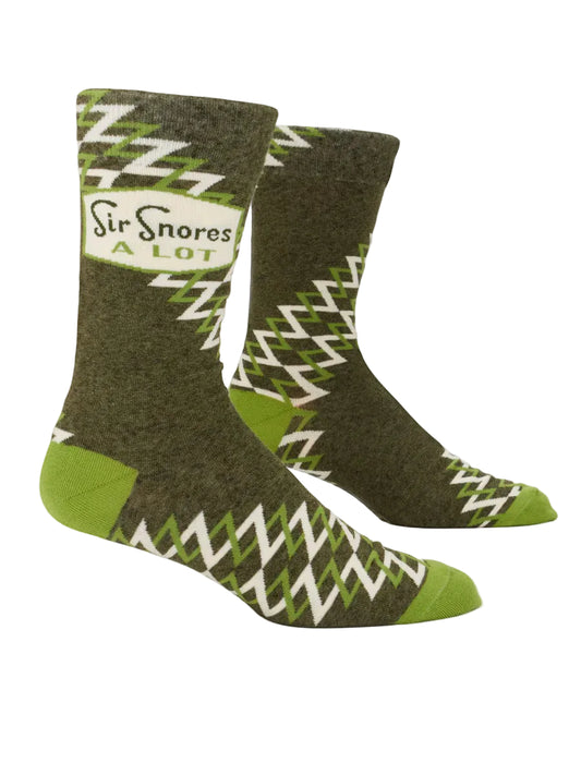 Green socks with white zigzag pattern and text on a white background