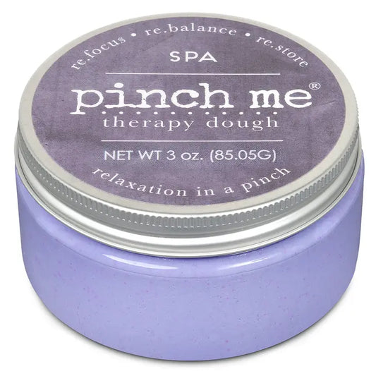 A container of Pinch Me therapy dough in purple color with the label 'refresh' on it.