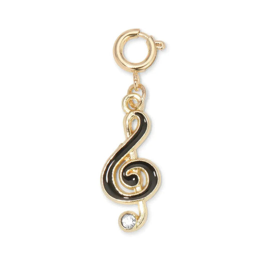 Gold and black treble clef charm with a rhinestone at the bottom on a white background
