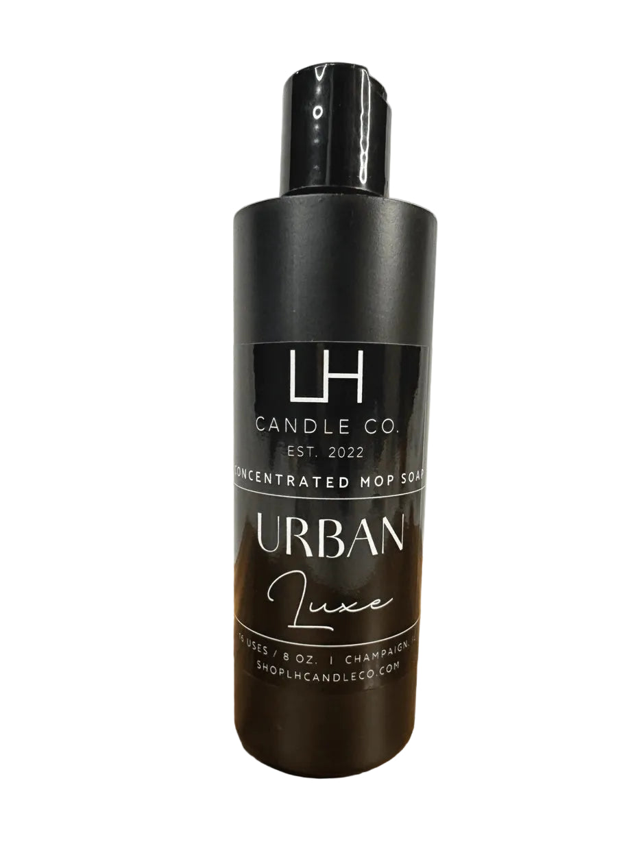 Bottle of LH Candle Co. concentrated mop soap with 'Urban Luxe' label on a white background