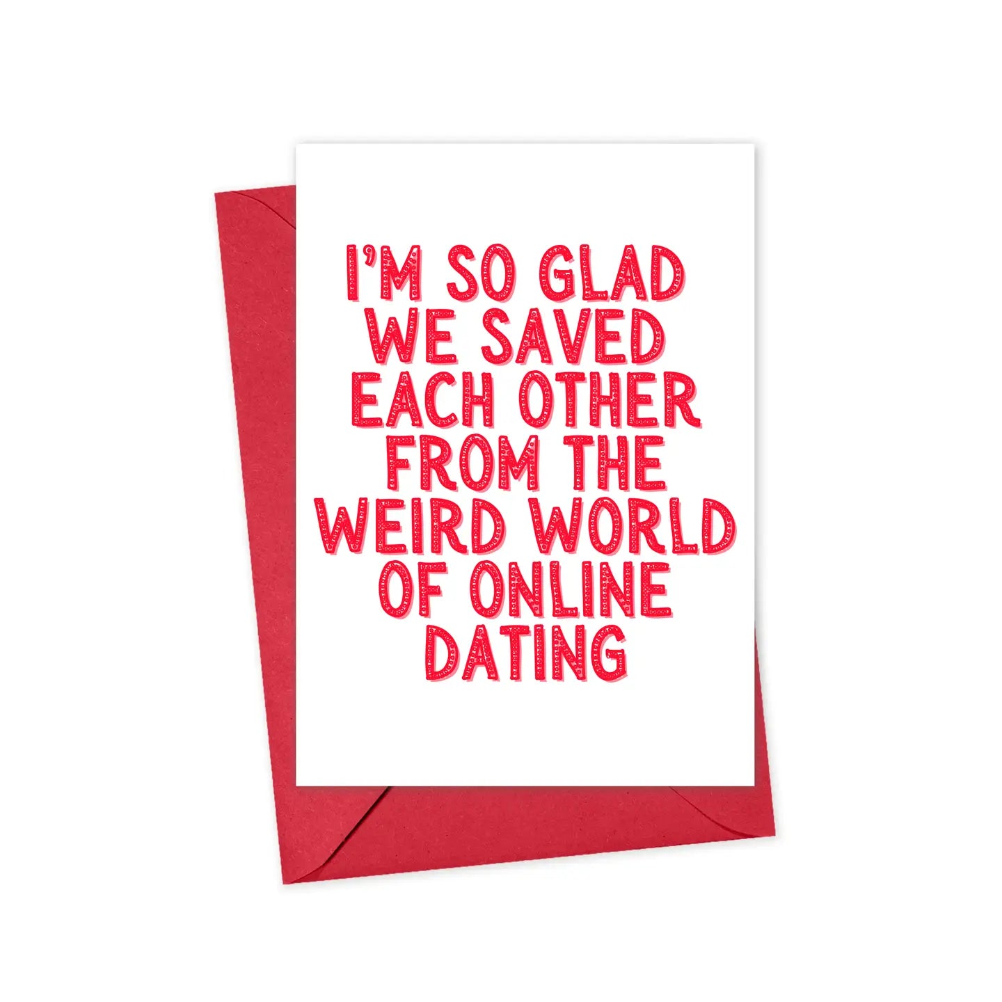 A greeting card with a white background and red text that reads 'I'm SO GLAD WE SAVED EACH OTHER FROM THE WEIRD WORLD OF ONLINE DATING' with a red envelope on a white background