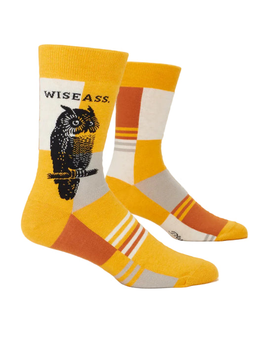 Two socks with an owl design and text on a white background